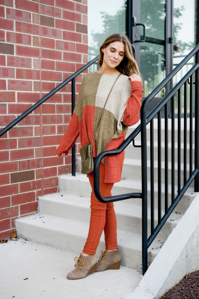 Orange and olive color block sweater