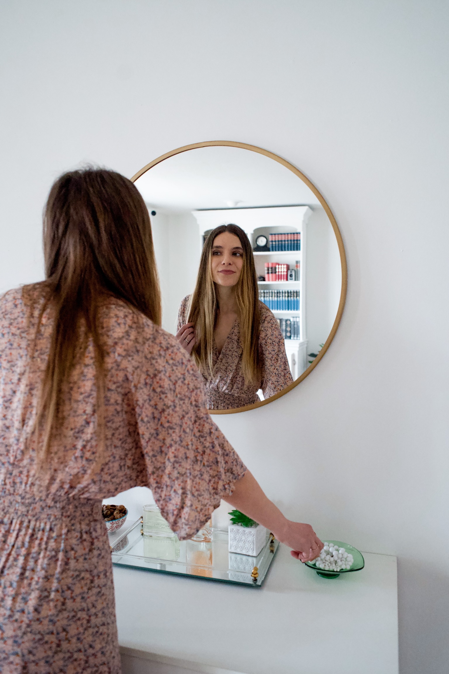 Round gold entry way mirror